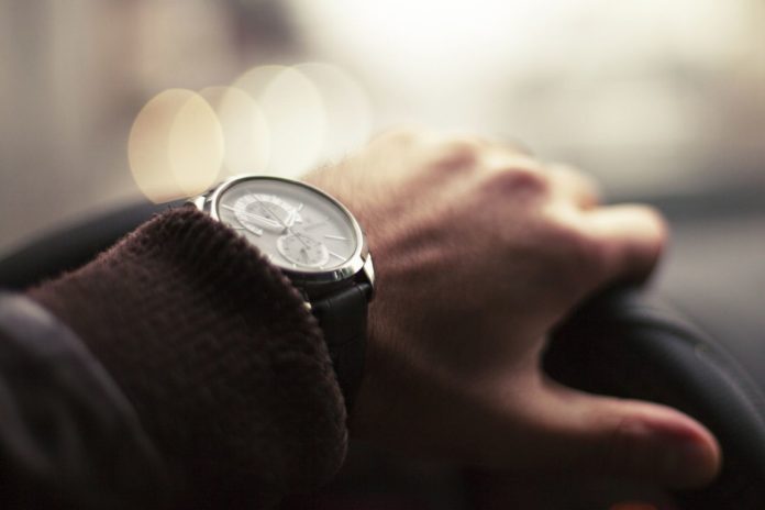 Wristwatch on arm, timepiece