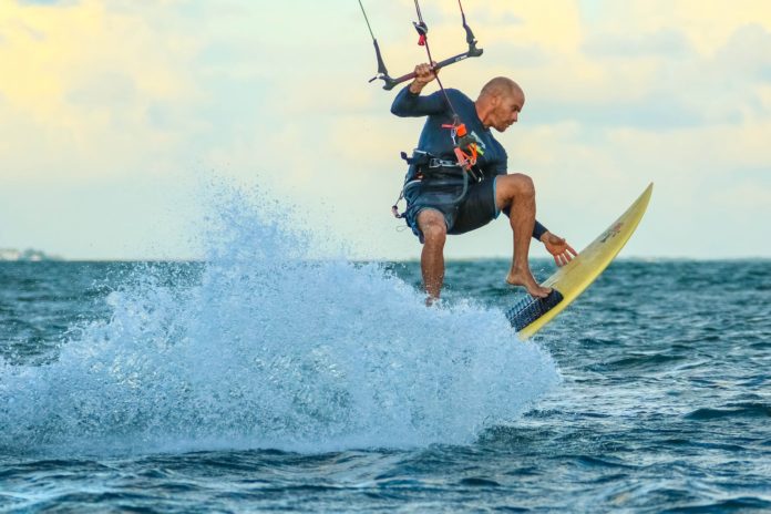 photo of man surfing